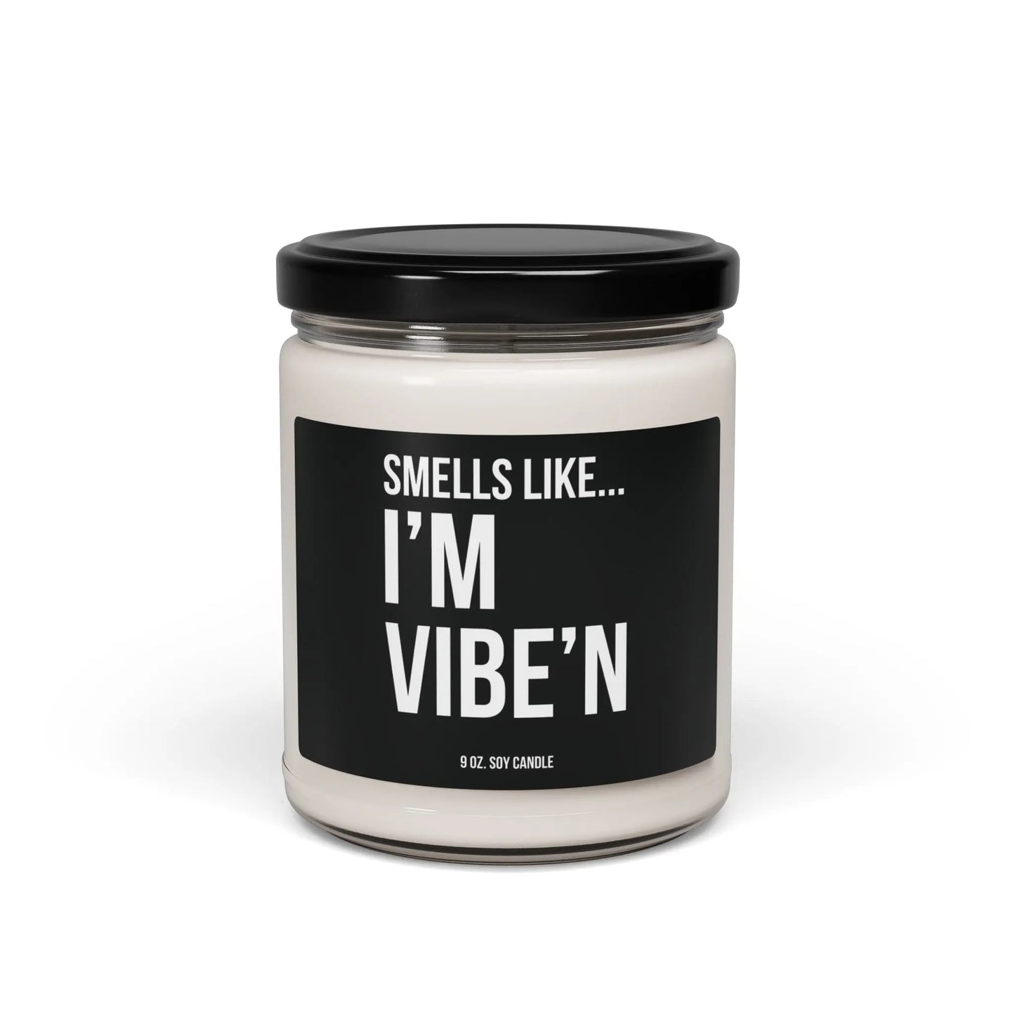 Urban Cookie’s funny scented candle “Vibe Scent” 9 oz soy candle in a minimalist clear jar with White text on a black label with a sleek black lid, exuding a fresh, bold aroma and cool vibe.