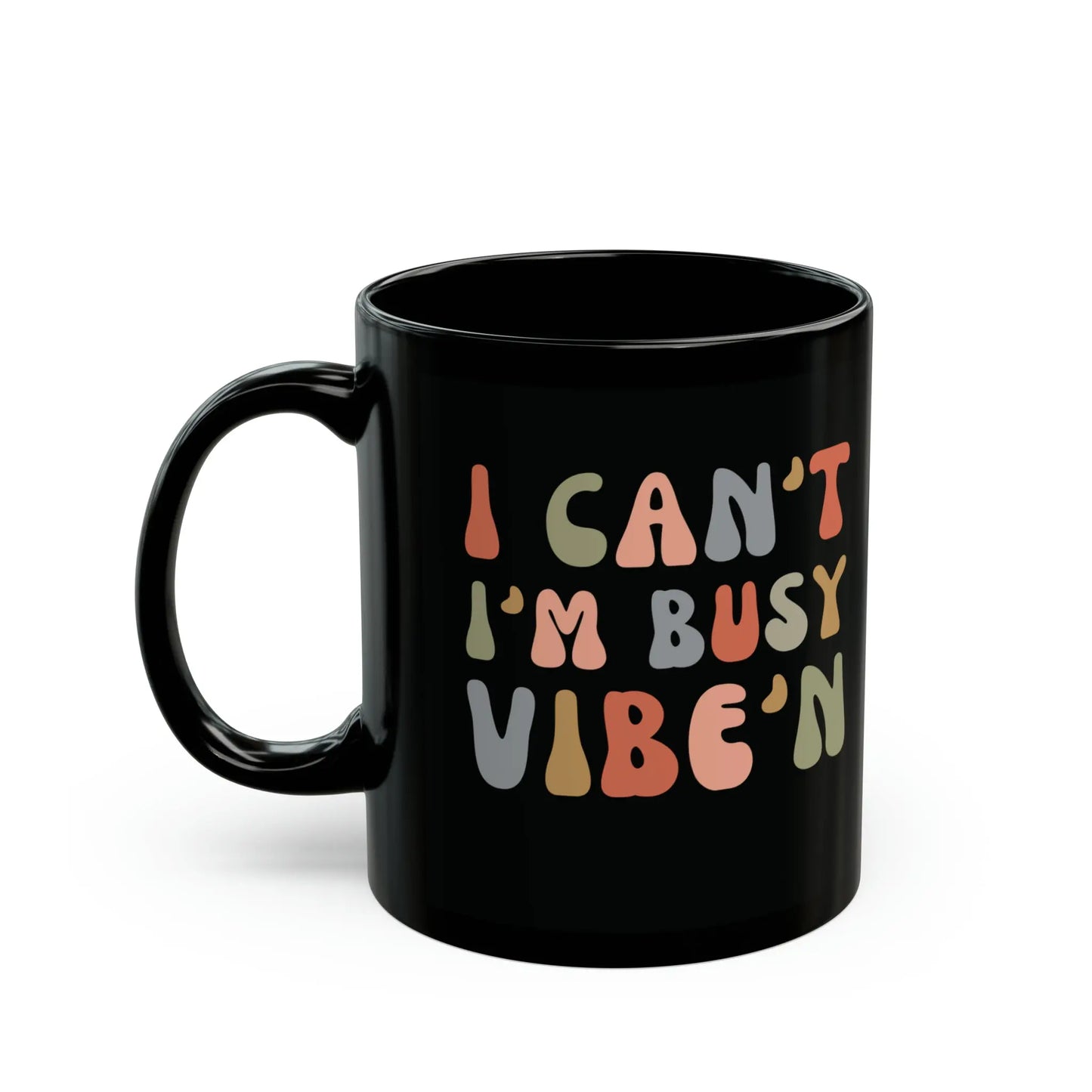Urban Cookie's Black Vibe'n ceramic mug with colorful text "I can't, I'm Busy Vibe'n."