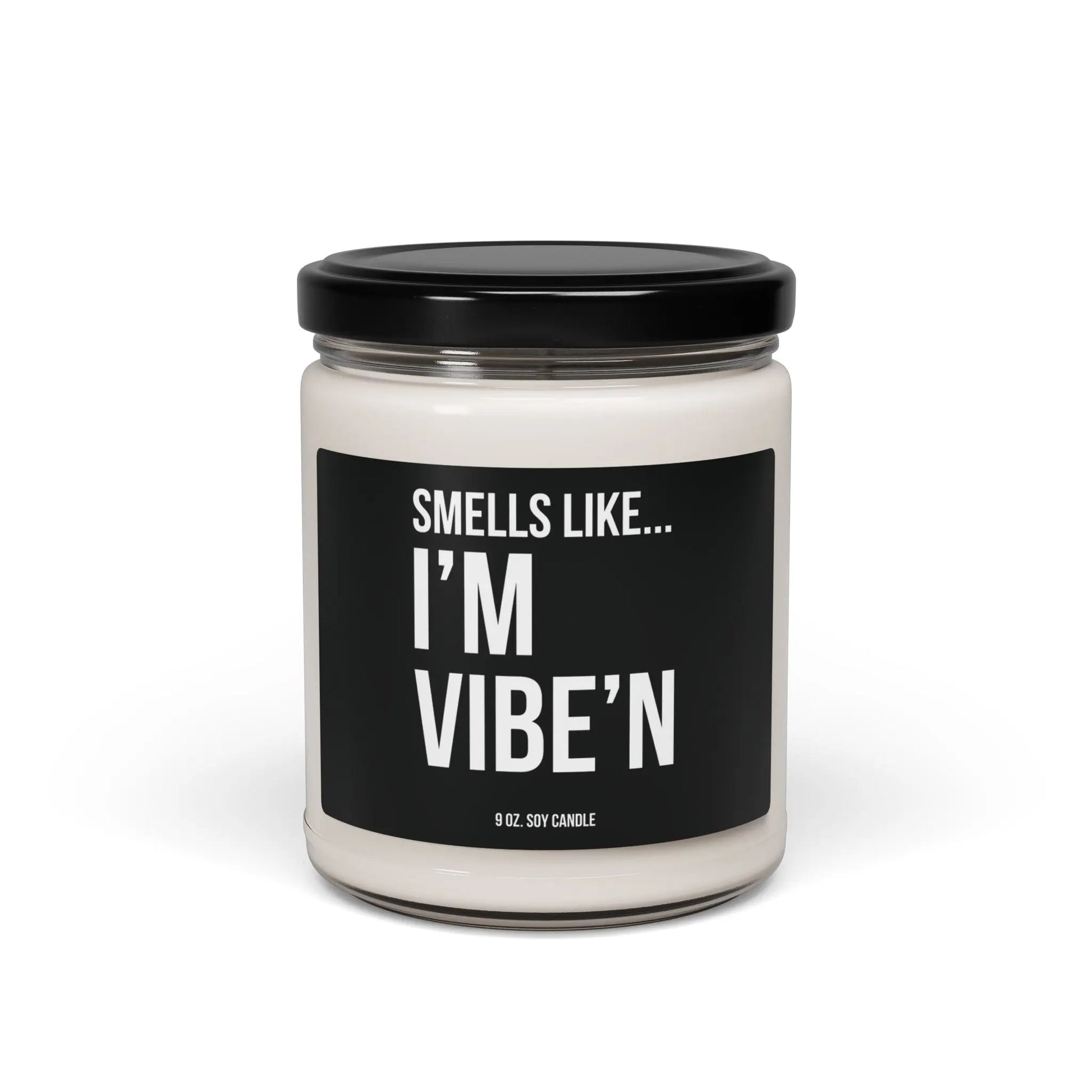 Urban Cookie’s funny scented candle “Vibe Scent” 9 oz soy candle in a minimalist clear jar with White text on a black label with a sleek black lid, exuding a fresh, bold aroma and cool vibe.