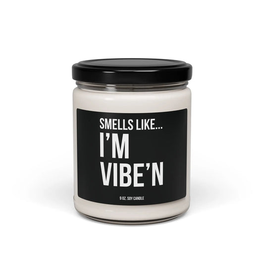 Urban Cookie’s funny scented candle “Vibe Scent” 9 oz soy candle in a minimalist clear jar with White text on a black label with a sleek black lid, exuding a fresh, bold aroma and cool vibe.
