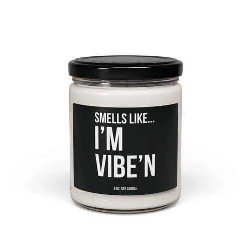 Urban Cookie’s funny scented candle “Vibe Scent” 9 oz soy candle in a minimalist clear jar with White text on a black label with a sleek black lid, exuding a fresh, bold aroma and cool vibe.