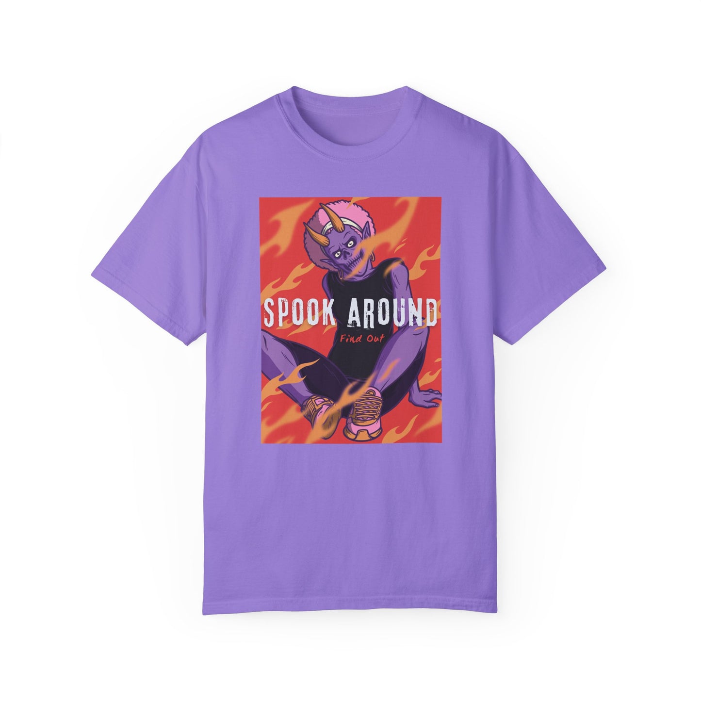 Violet (Purple) t-shirt with a casually dressed purple monster with horns wearing sneakers and earrings sitting in orange flames. Spook Around Find Out bold text.